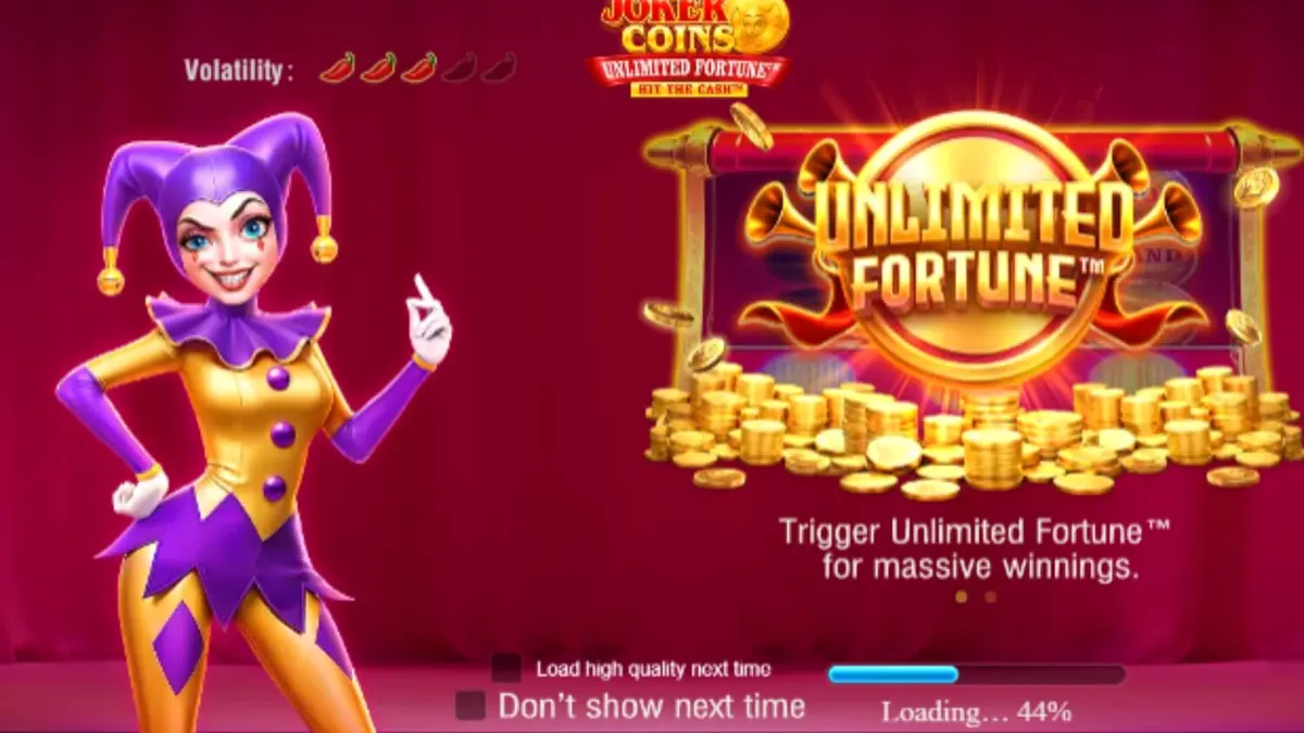 Joker Coins Unlimited Fortune slot machine interface na may mga neon fruit symbols at joker character